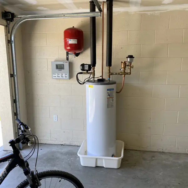 Closed loop solar tank in garage
