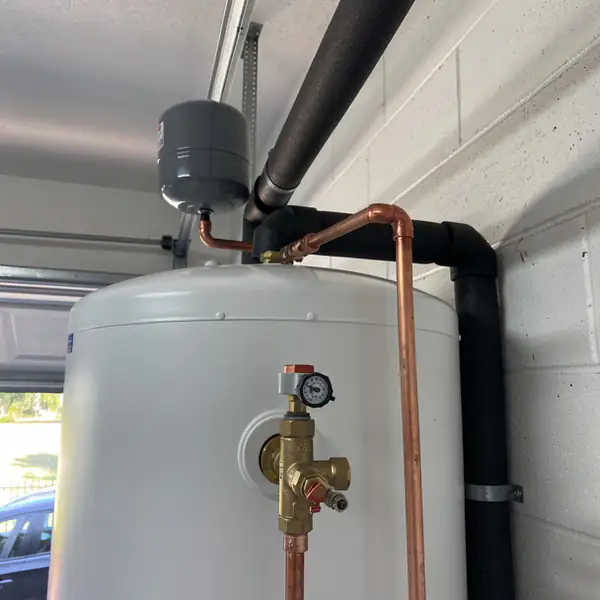Mixing valve and expansion tank piping