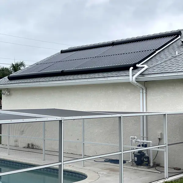 Older solar pool panels on shingle roof