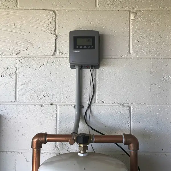 Solar hot water controller on garage wall