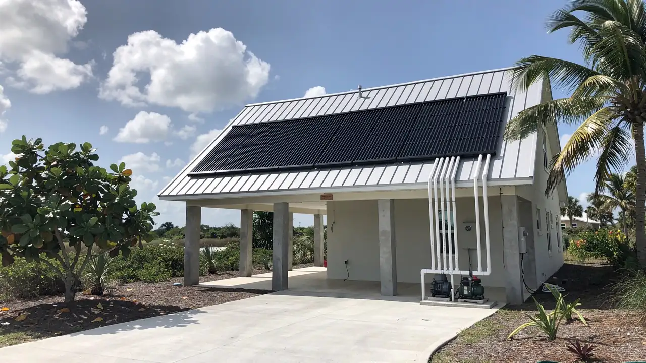 Solar pool panels on elevated island home Solar pool panels on elevated island home