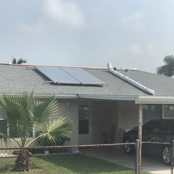 Southeast Cape shingle roof with solar collector