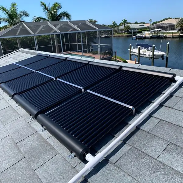 Stainless-strapped pool panels on canal-front tile roof
