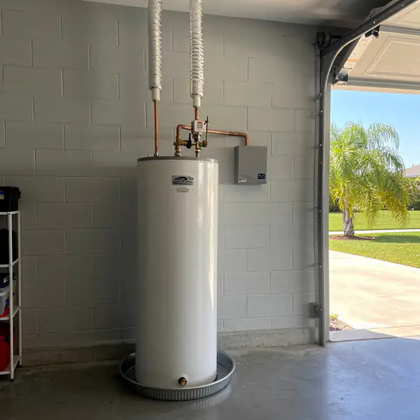 White 80 gallon solar tank in garage
